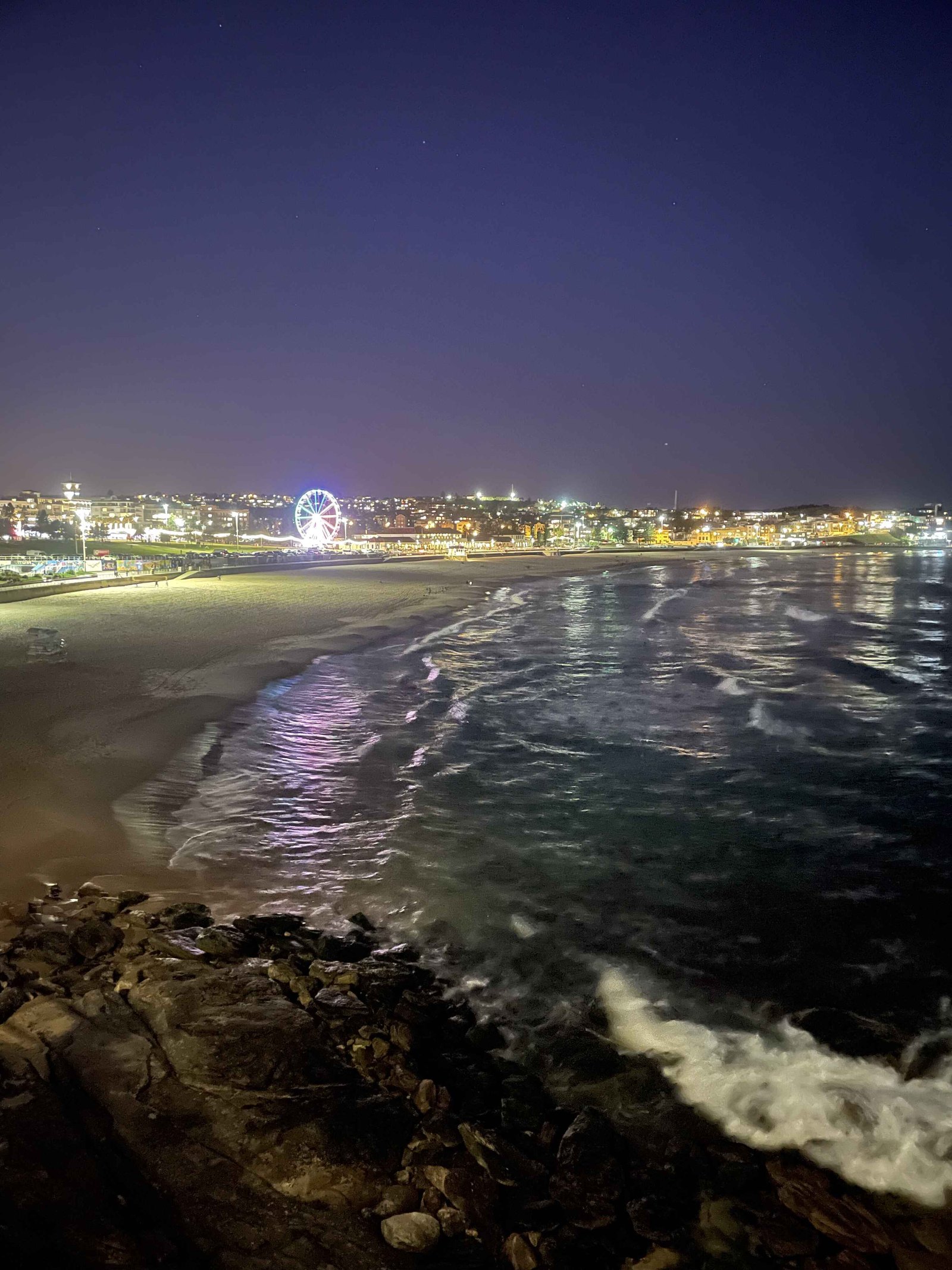 Bondi beach lit up at night